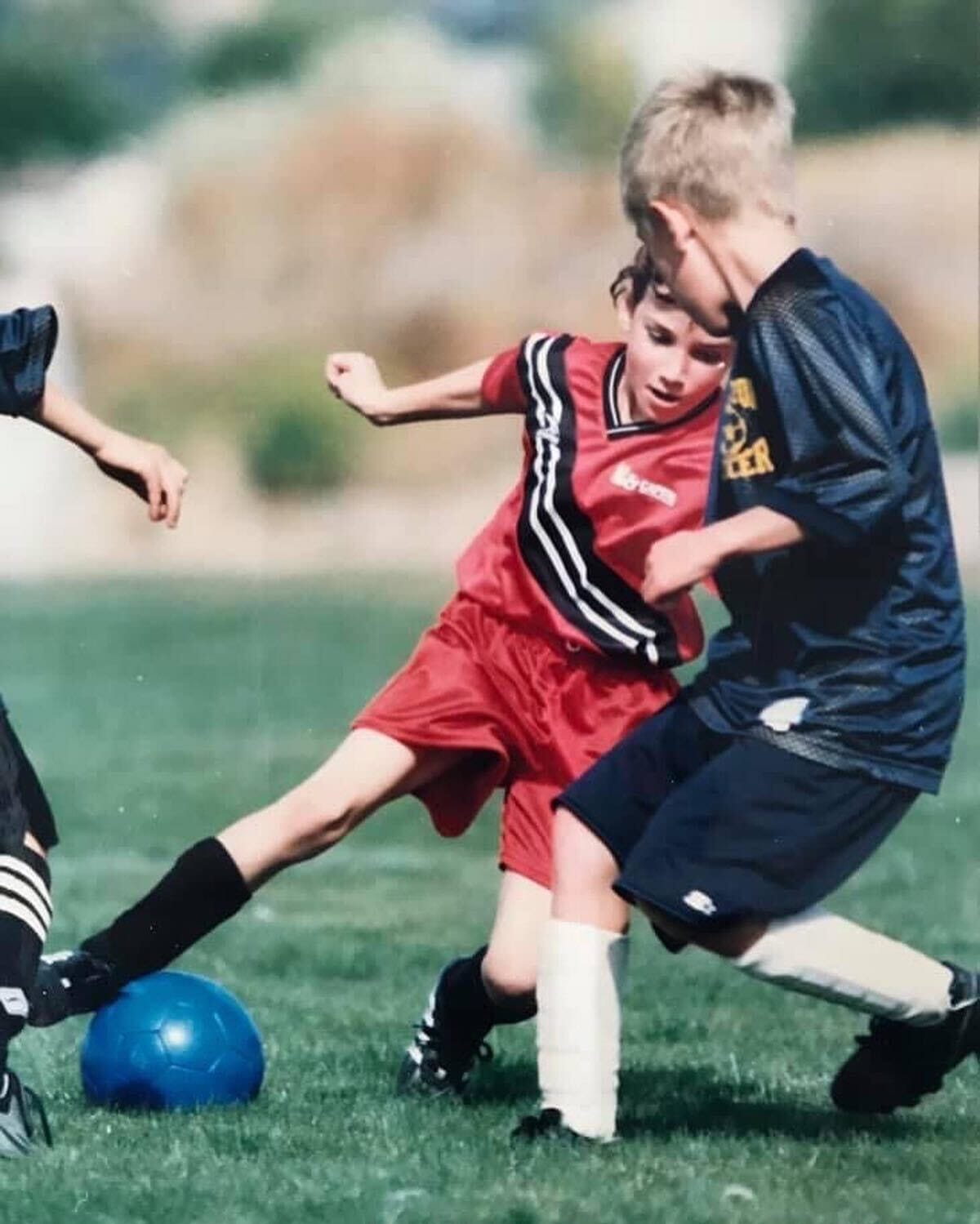 children playing soccer