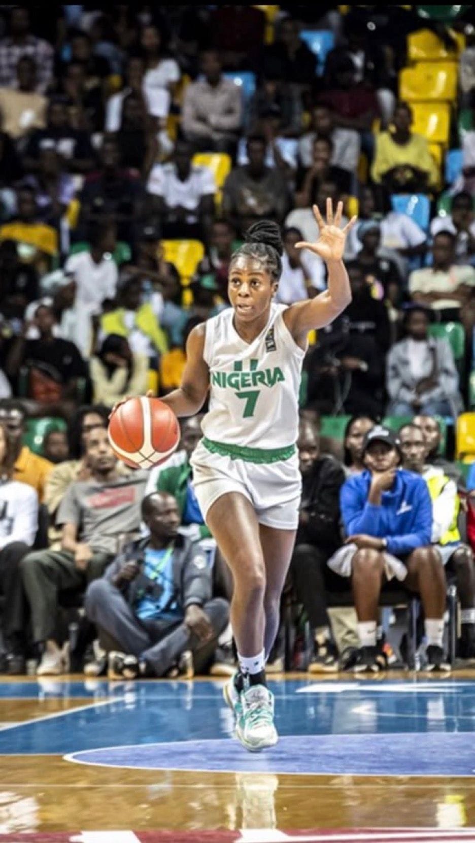 Ogoke dribbles on the court at a Nigeria game