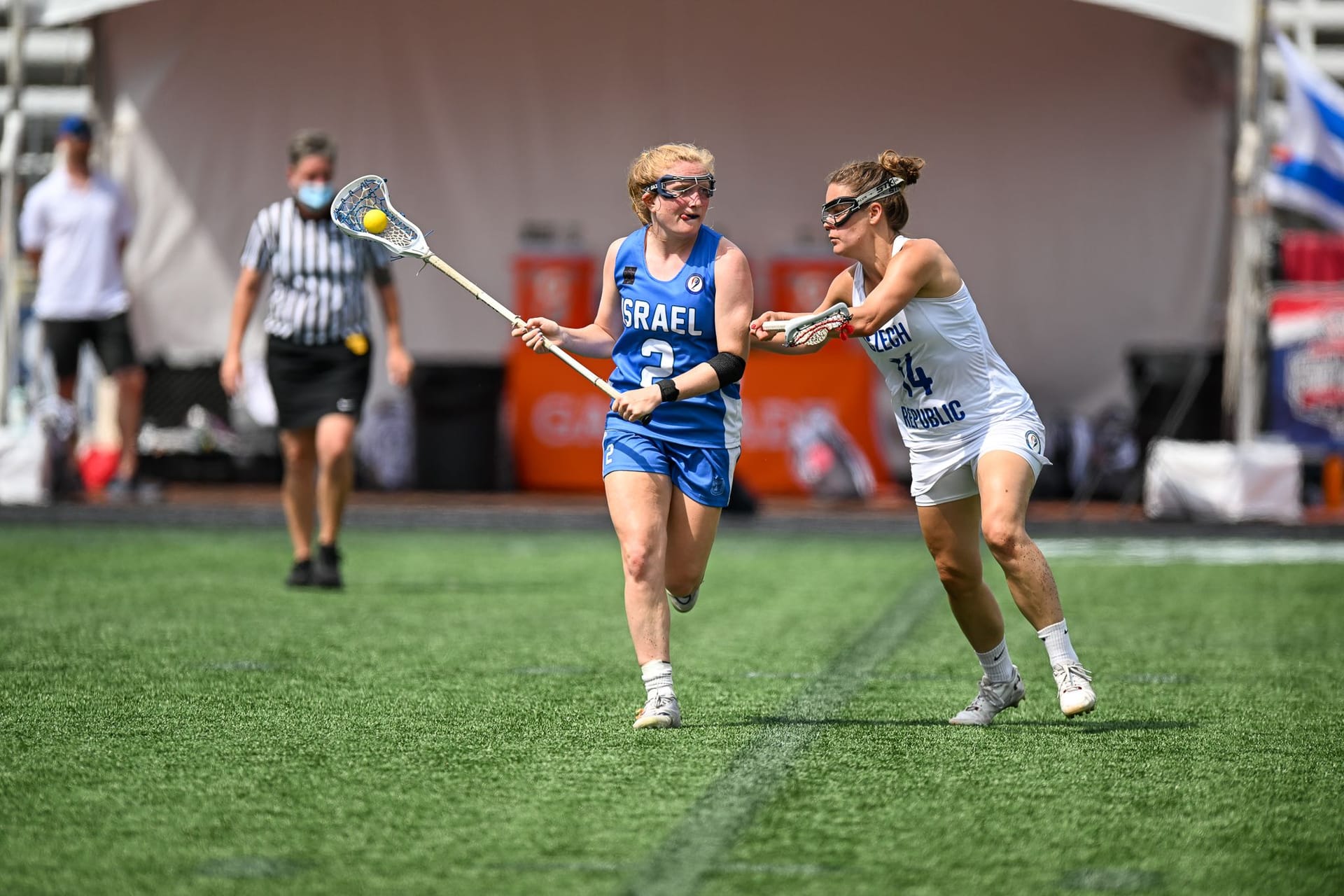 Lindsay playing at a lacrosse game