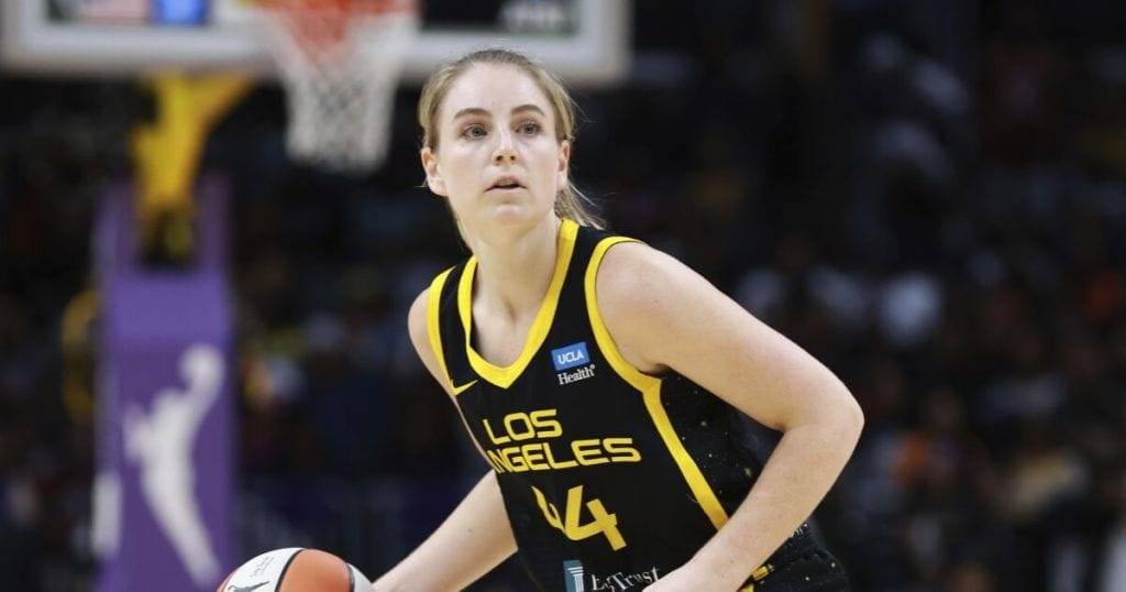 Karlie with the ball at a Sparks game