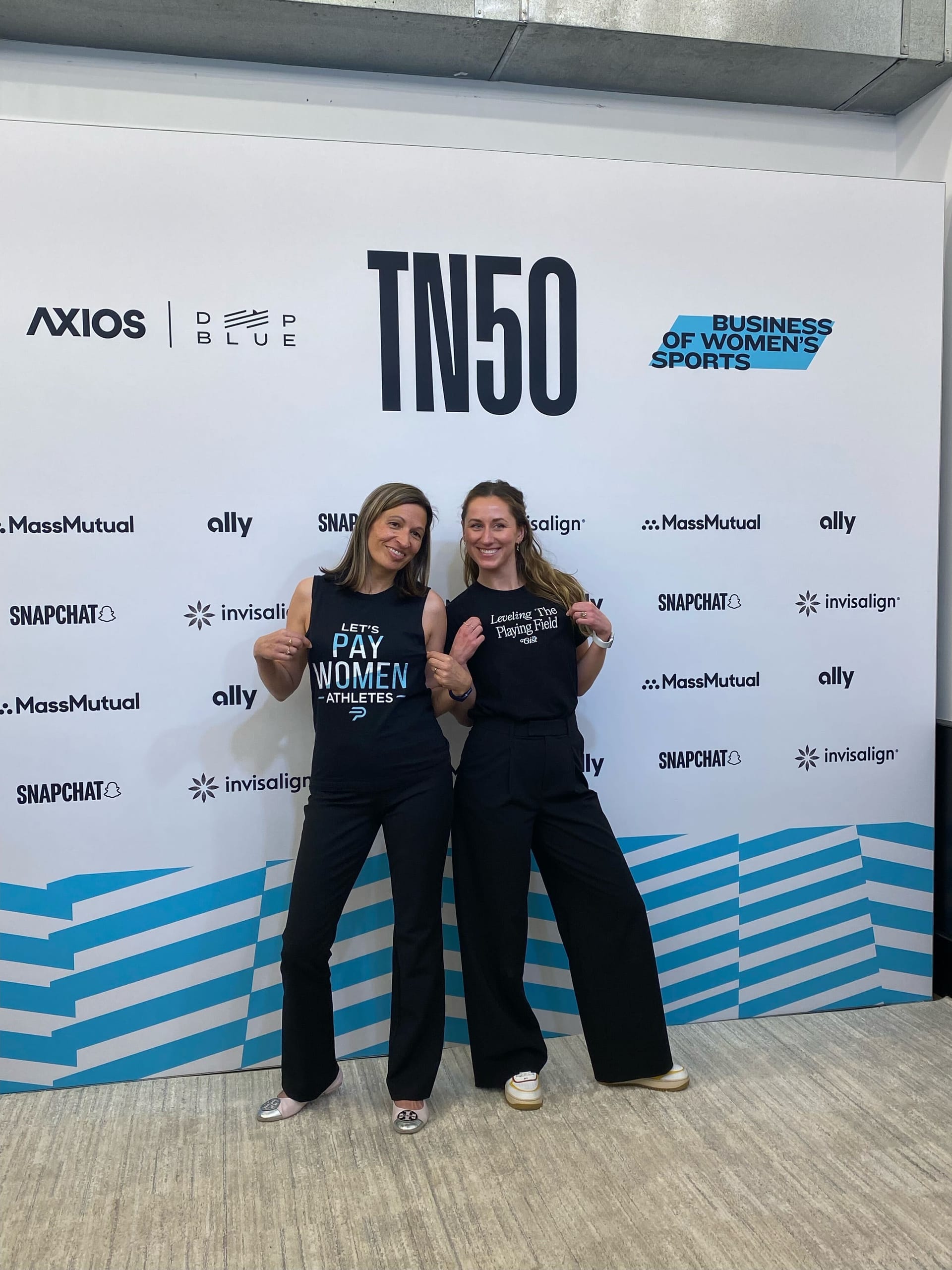 2 representatives from Parity & Gist pose together at TN50