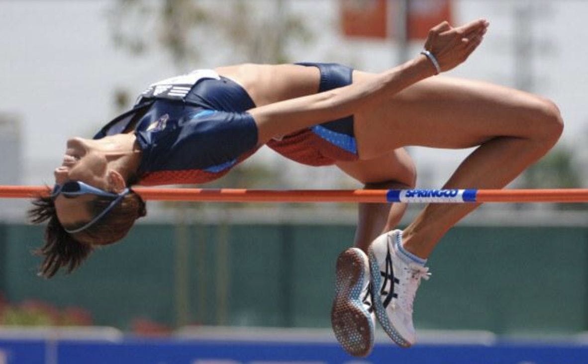 Erin performing a high jump