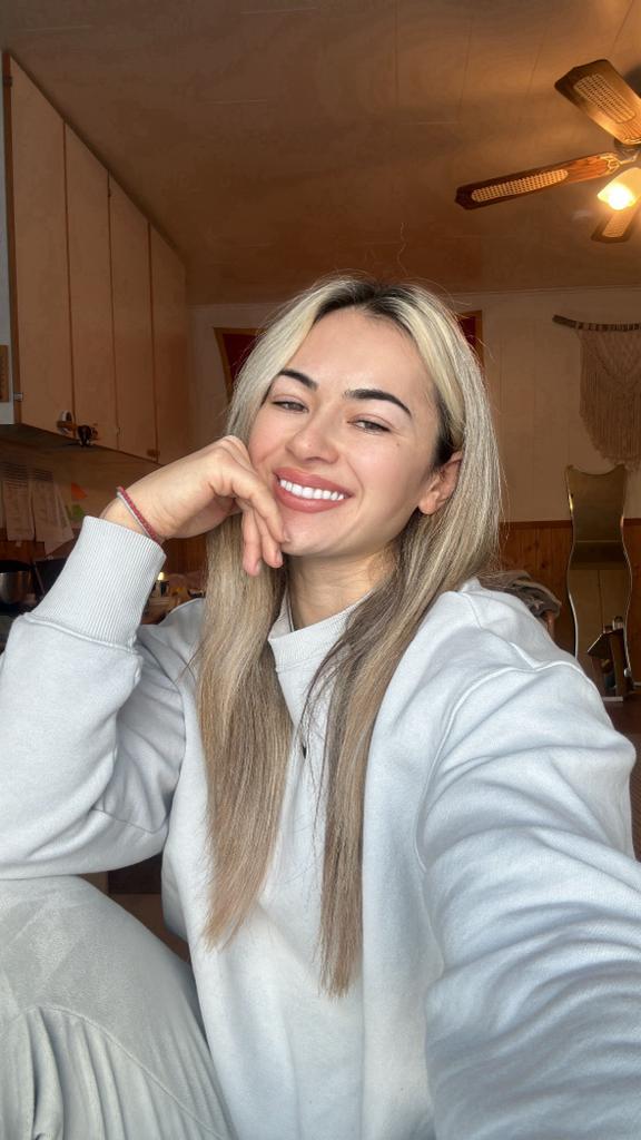 smiling selfie of Marija at home