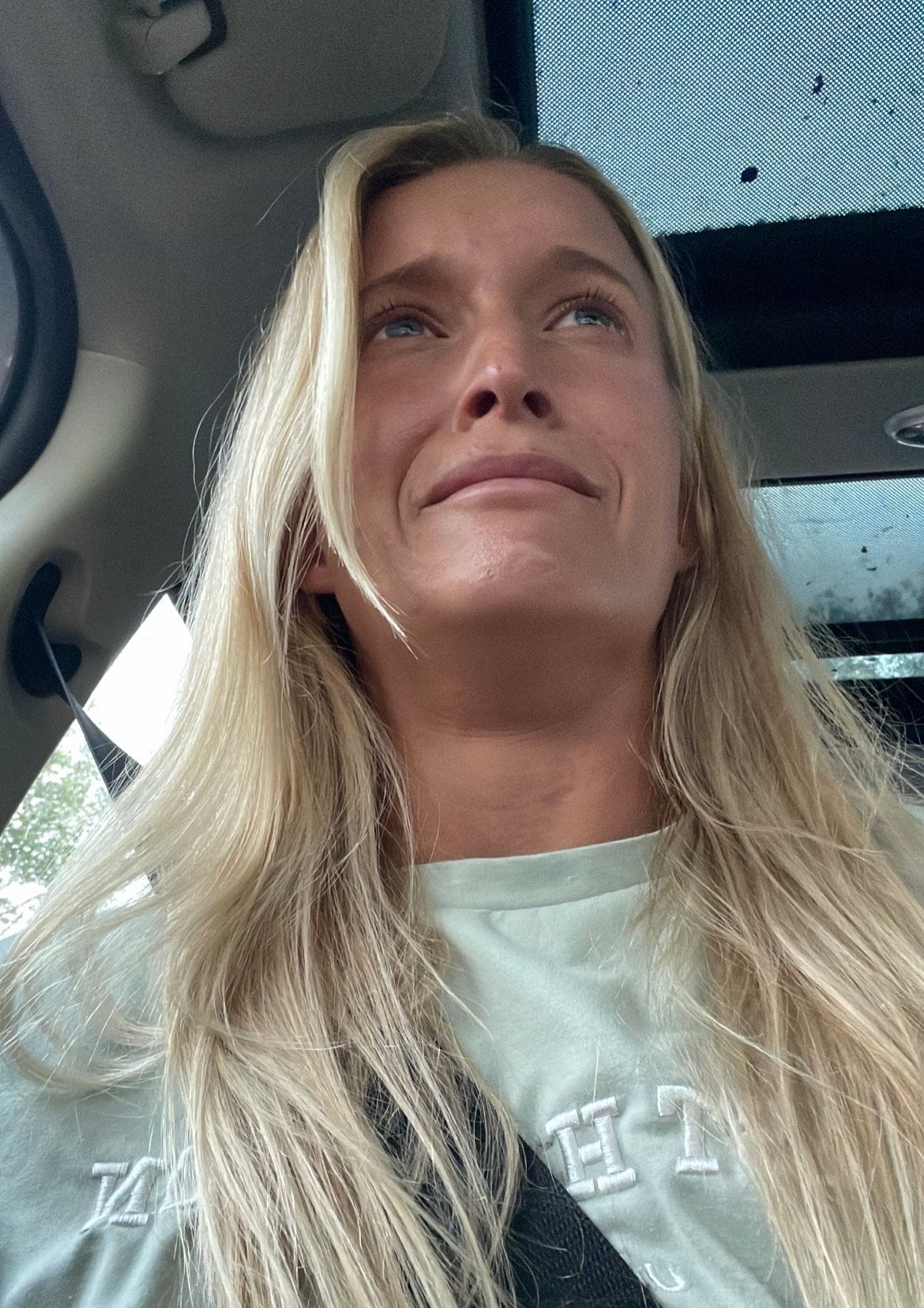 Elizabeth selfie on the verge of tears in car