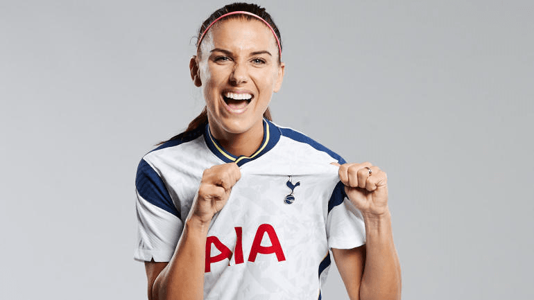 Alex Morgan smiling in her team jersey