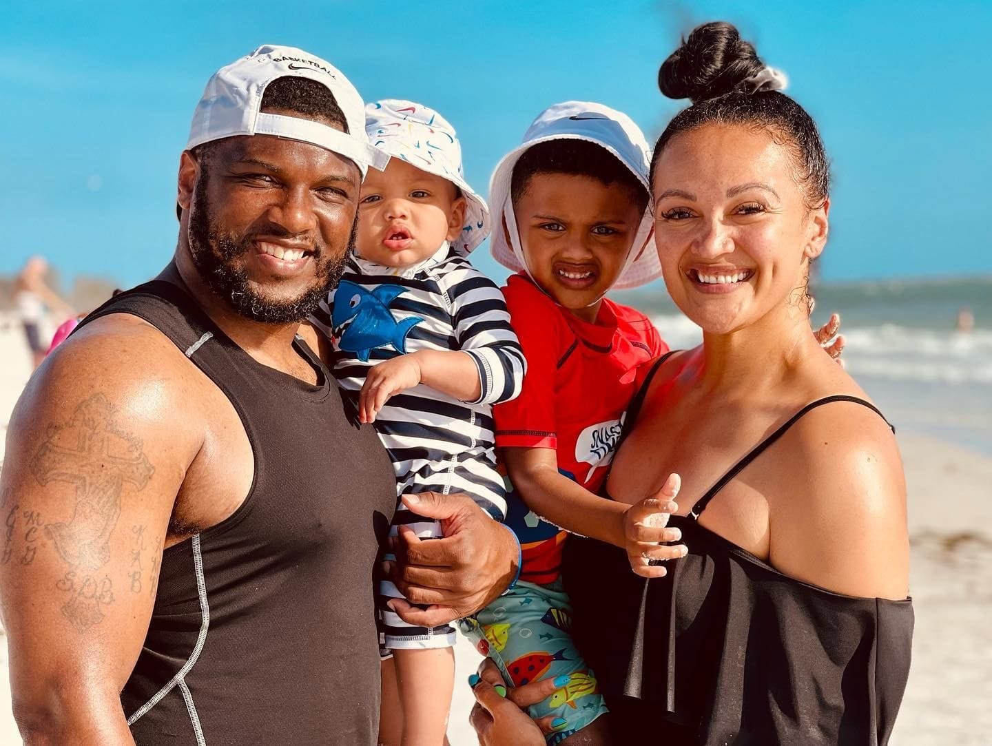 Mistie with her family at the beach